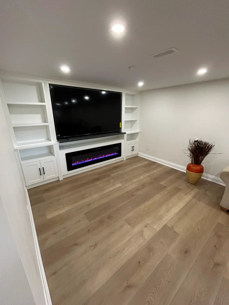Finished basement with a built-in media wall